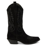 Gaucho Western Boot – Coconuts By Matisse – Black suede mid-calf boots with classic Western stitching, pull tabs, and a pointed toe. A timeless cowboy silhouette made for everyday edge and effortless cool.