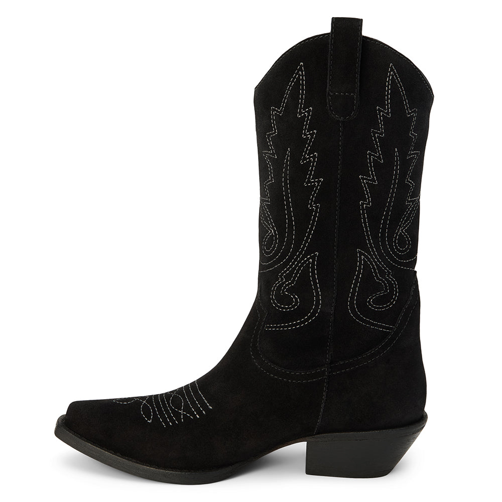 Gaucho Western Boot – Coconuts By Matisse – Black suede mid-calf boots with classic Western stitching, pull tabs, and a pointed toe. A timeless cowboy silhouette made for everyday edge and effortless cool.
