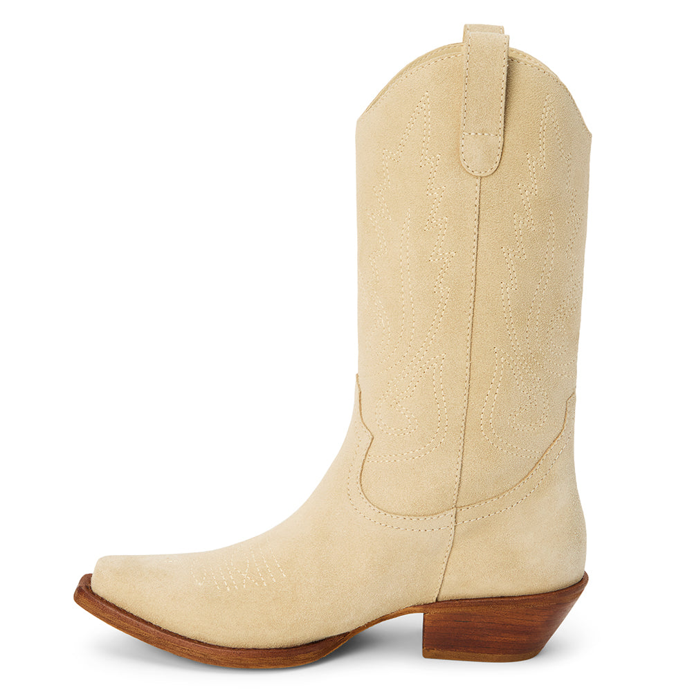 Gaucho Western Boot – Coconuts By Matisse – Natural suede mid-calf boots with classic Western stitching, pull tabs, and a pointed toe. A timeless cowboy silhouette made for everyday edge and effortless cool.