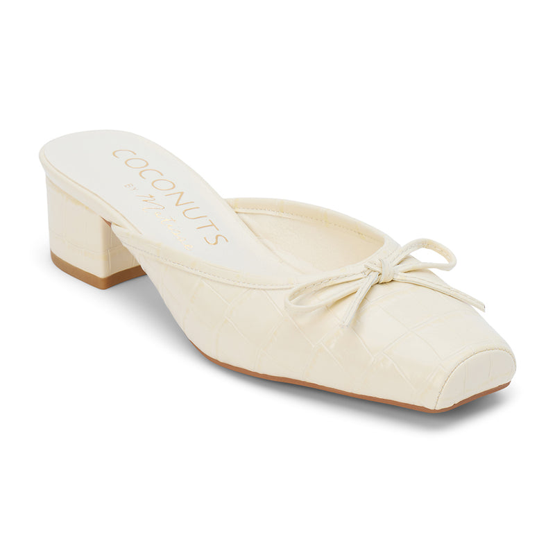 Geneva Heeled Mule – Coconuts by Matisse – Ivory croc-embossed mule with a square toe, low block heel, and delicate bow detail.