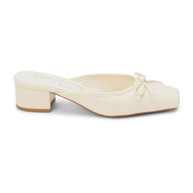 Geneva Heeled Mule – Coconuts by Matisse – Ivory croc-embossed mule with a square toe, low block heel, and delicate bow detail.