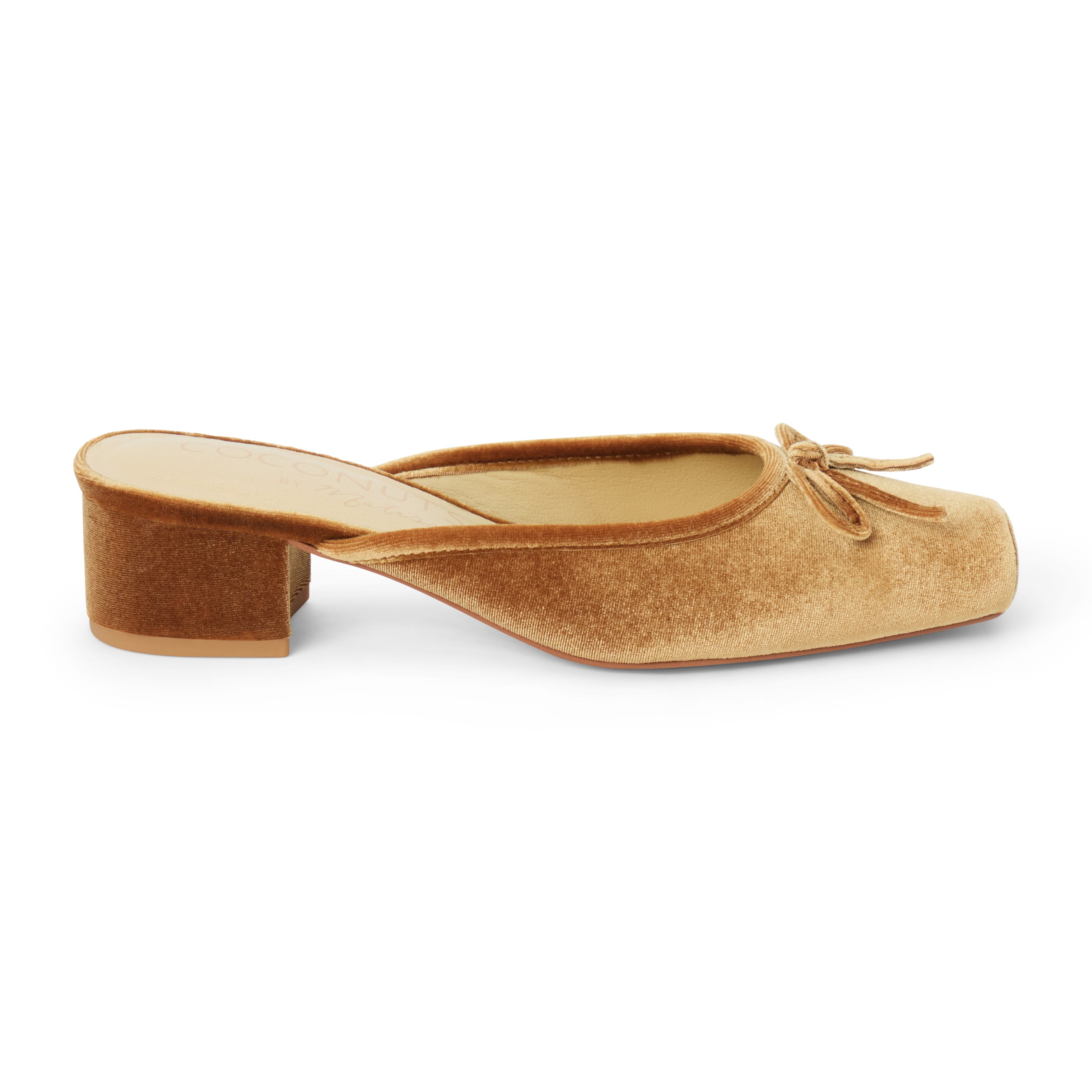 Vegan tan velvet heeled mule with a square toe, tonal bow detail, open back, and low block heel shown on a white background.