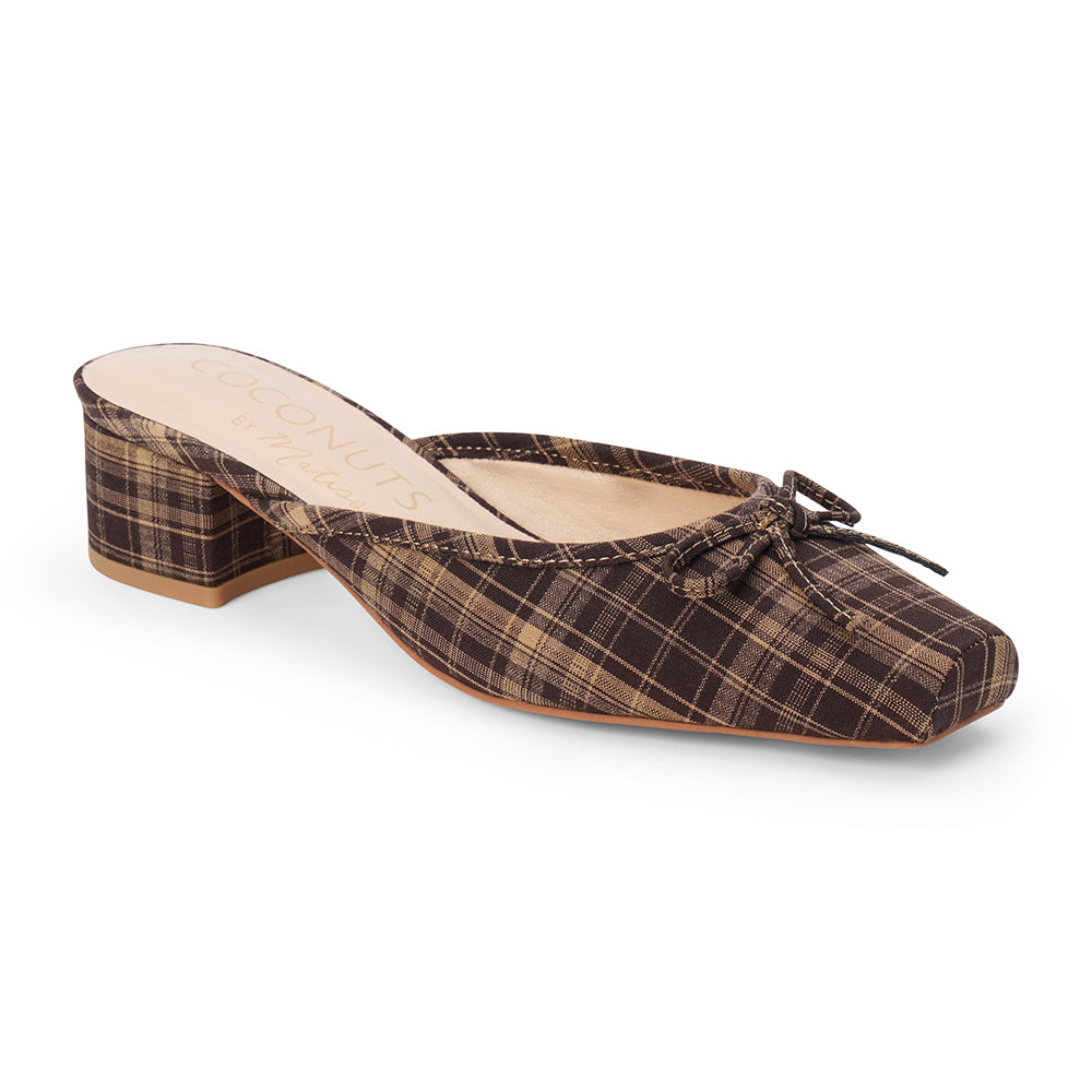 Vegan brown and tan plaid textile heeled mule with a square toe, bow detail, open back, and low block heel shown on a white background.