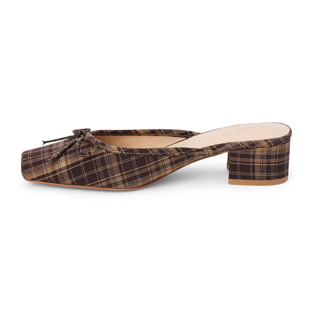 Vegan brown and tan plaid textile heeled mule with a square toe, bow detail, open back, and low block heel shown on a white background.