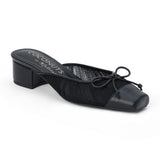 Vegan black mesh heeled mule with a square toe, tonal bow detail, solid toe cap, and low block heel shown on a white background.