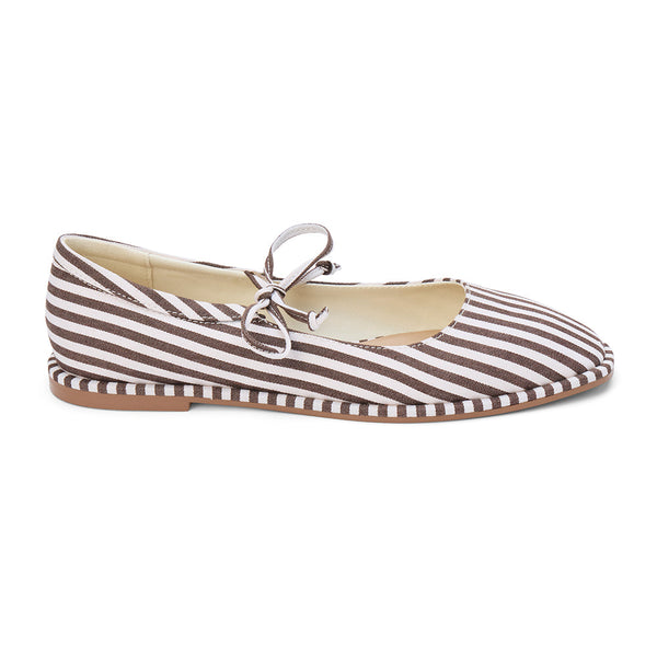 Gerry Ballet Flat – Coconuts By Matisse – Brown and white striped ballet flat with a rounded toe, delicate crossover tie, and classic bow detail. A playful take on nautical style with feminine charm and everyday ease.