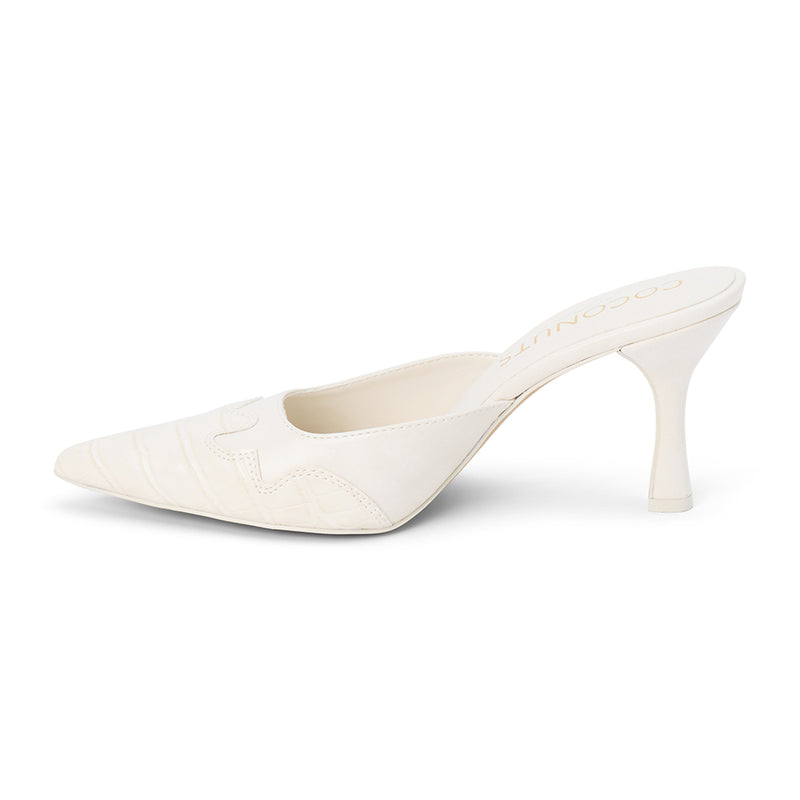 Greer Vegan Heeled Mule – Coconuts by Matisse – White pointed-toe mule with Western-inspired stitching, faux croc embossing, and a sculpted heel.