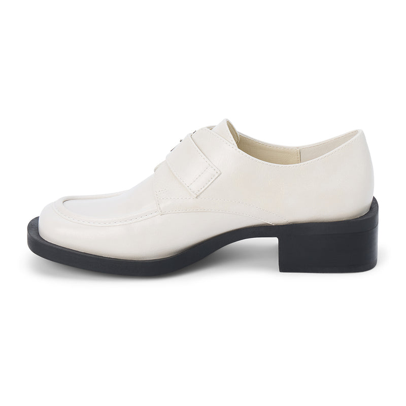 Hilary Loafer – Coconuts by Matisse – White faux leather loafer with oversized buckle and low block heel.