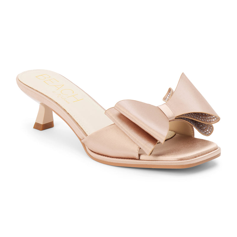 Holland Vegan Heeled Sandal – Beach by Matisse – Nude satin slip-on sandal with kitten heel and oversized double bow detail.