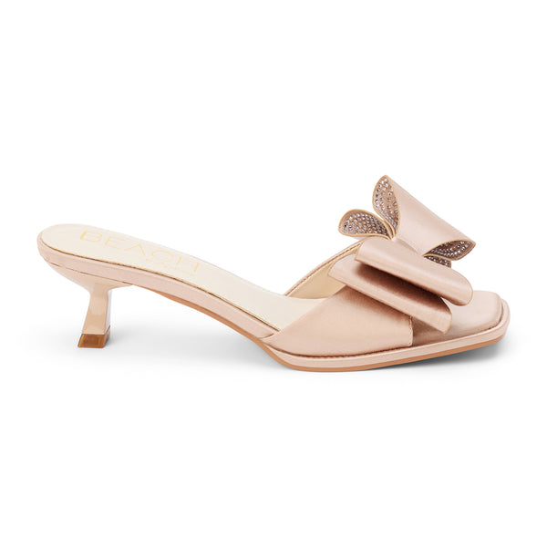 Holland Vegan Heeled Sandal – Beach by Matisse – Nude satin slip-on sandal with kitten heel and oversized double bow detail.