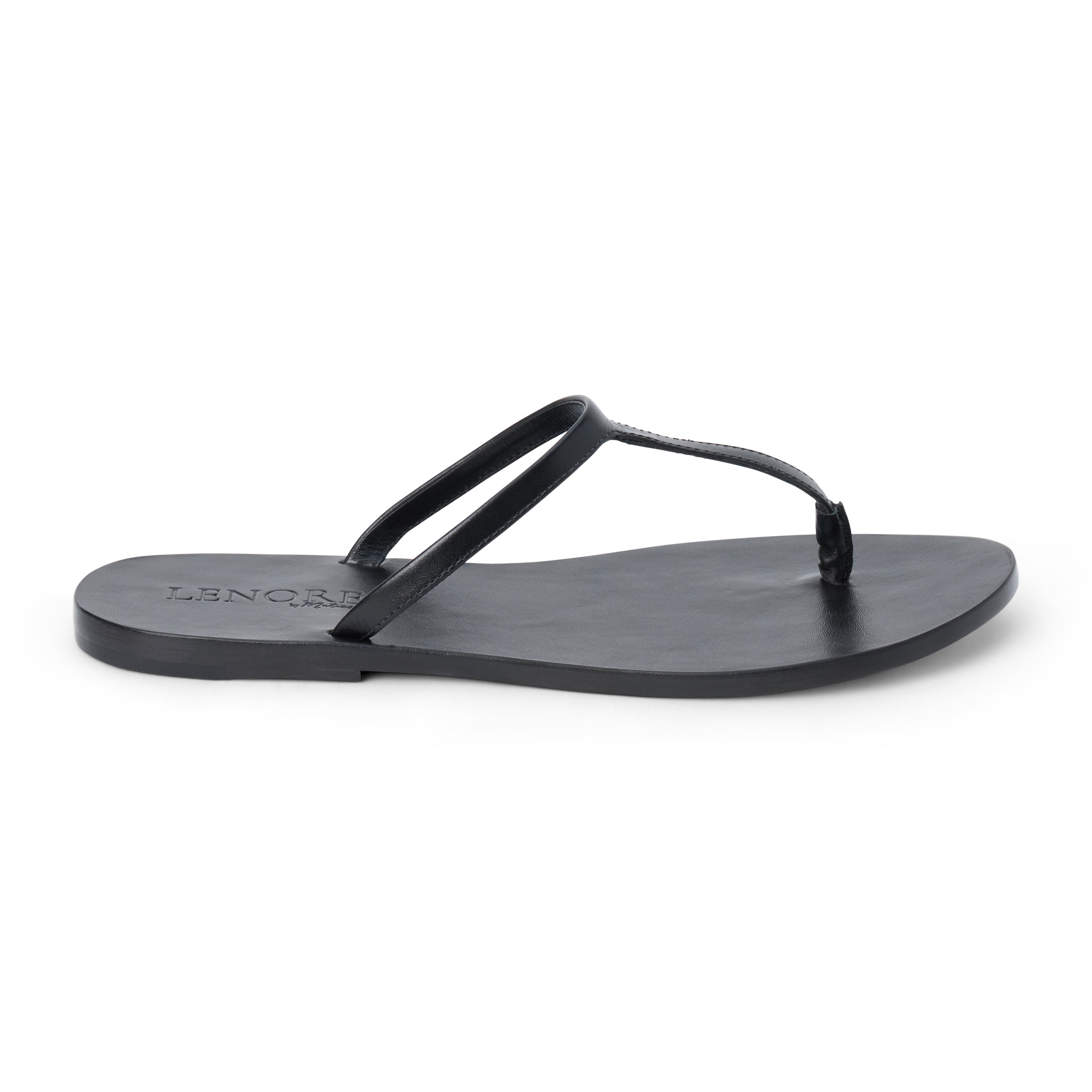 Black leather flat thong sandal with slim straps and minimalist design, shown on a white background.