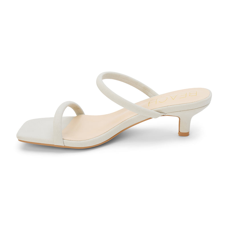 Jeanne Vegan Heeled Sandal – Beach by Matisse – Light beige double-strap sandal with low kitten heel and square toe.