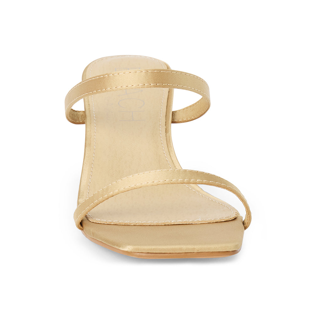 Vegan tan satin sandal with slim toe and instep straps, a square toe, and low kitten heel shown on a white background.