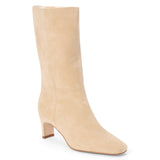 Vegan tan faux suede mid-calf boot with a streamlined shaft, square toe, tonal stitching, and slim heel shown on a white background.