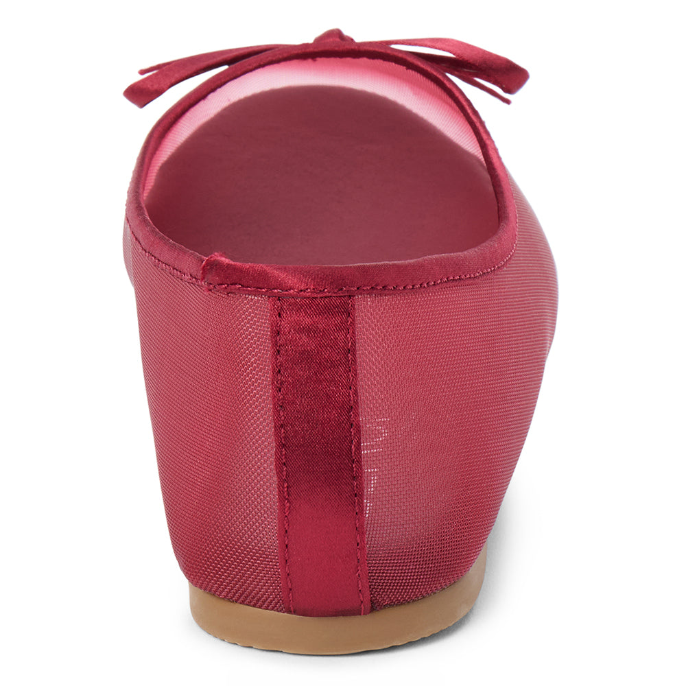 Vegan burgundy sheer mesh ballet flat with a rounded toe, tonal trim, matching toe panel, and small bow detail shown on a white background.