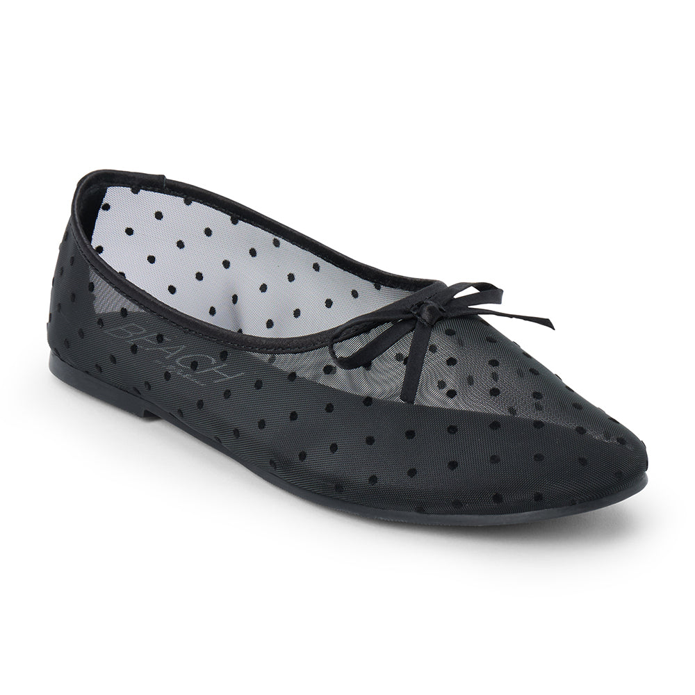 Vegan black sheer mesh ballet flat with black polka dots, a rounded toe, tonal trim, and small bow detail shown on a white background.