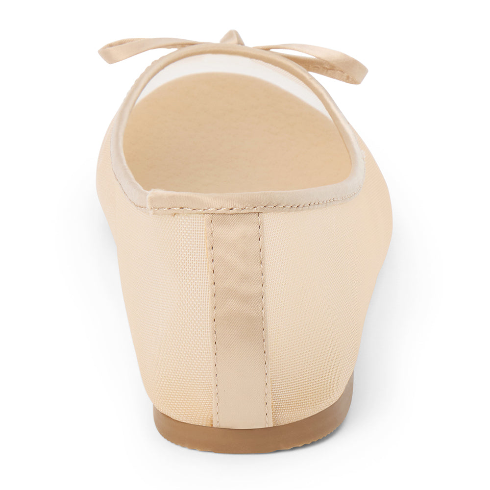 Vegan ivory sheer mesh ballet flat with a rounded toe, tonal trim, matching toe panel, and small bow detail shown on a white background.