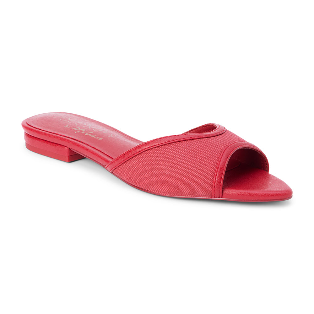 Red vegan slide sandal with wide strap and low heel, shown on a white background.