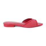 Red vegan slide sandal with wide strap and low heel, shown on a white background.