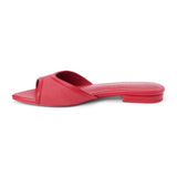 Red vegan slide sandal with wide strap and low heel, shown on a white background.