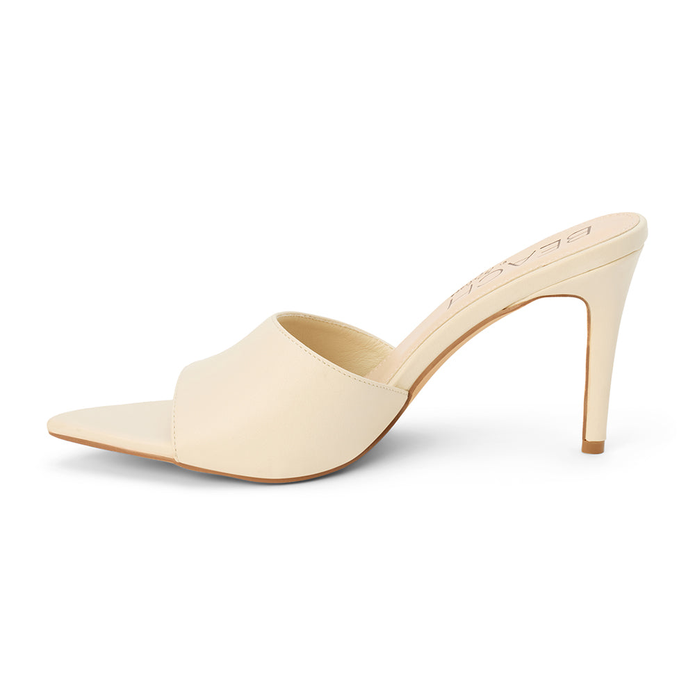 Ivory faux leather heeled sandal with a pointed toe, smooth upper, high heel, and slip-on design, shown on a white background.