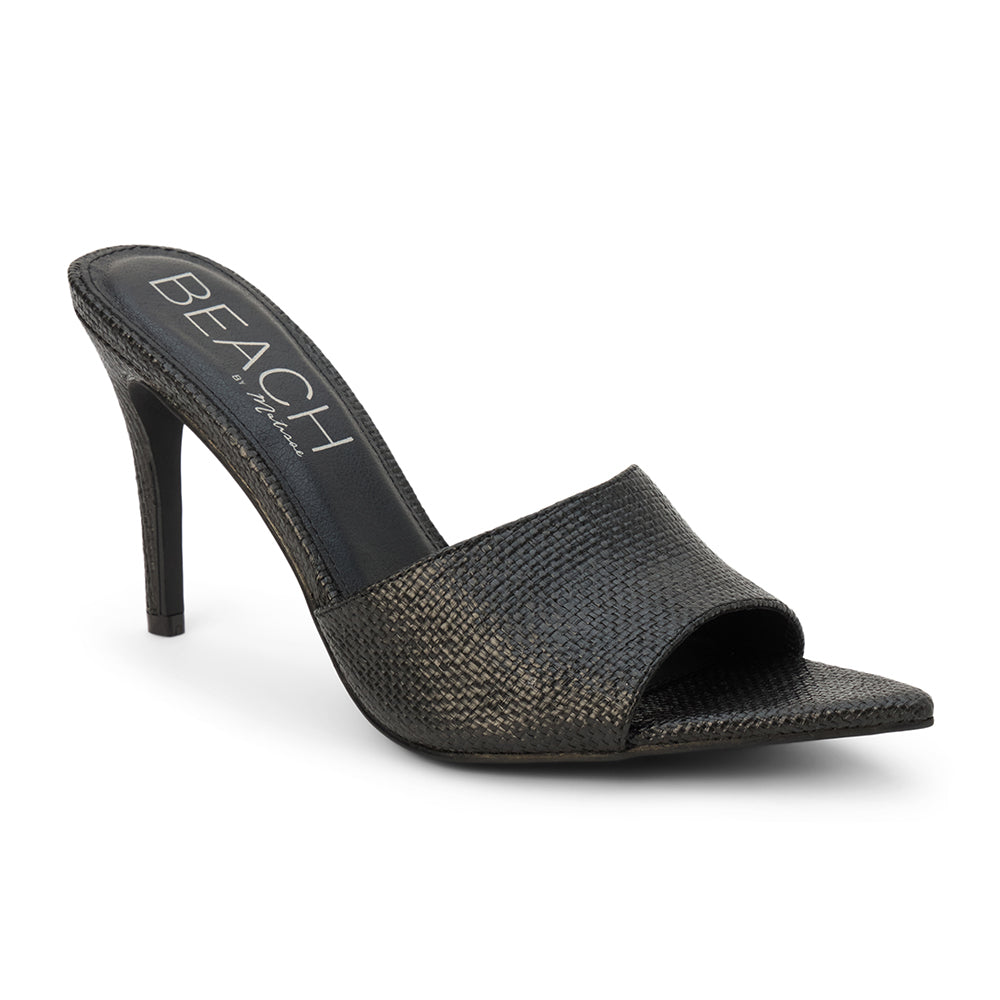 Black raffia heeled sandal with a pointed toe, woven upper, stiletto heel, and slip-on design, shown on a white background.