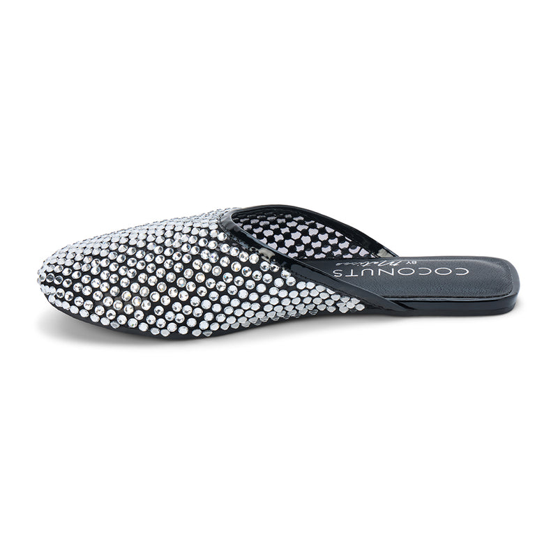 Karlie Vegan Embellished Mule – Coconuts by Matisse – Black mesh slip-on mule with allover crystal rhinestones and almond toe.