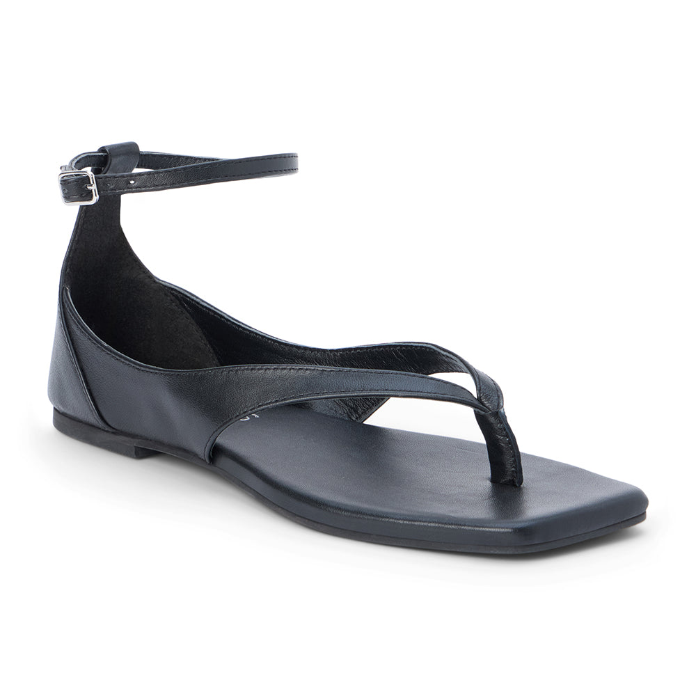 Black leather sandal with ankle strap and toe thong shown on a white background.