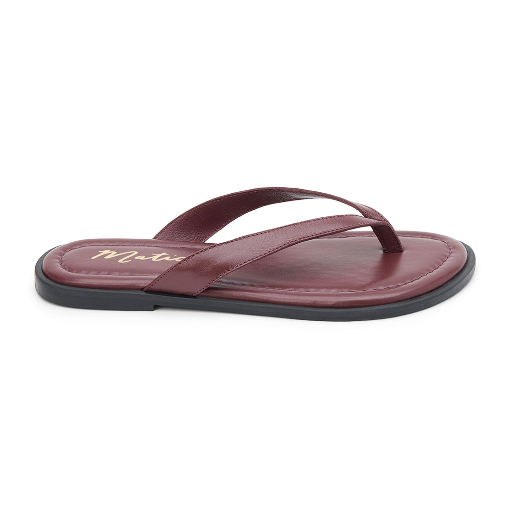Leo Flip Flop Sandal – Matisse Footwear – Burgundy leather flip flop sandals with cushioned footbed, wide thong strap, and sleek black sole. A laid-back yet refined essential for casual summer comfort.
