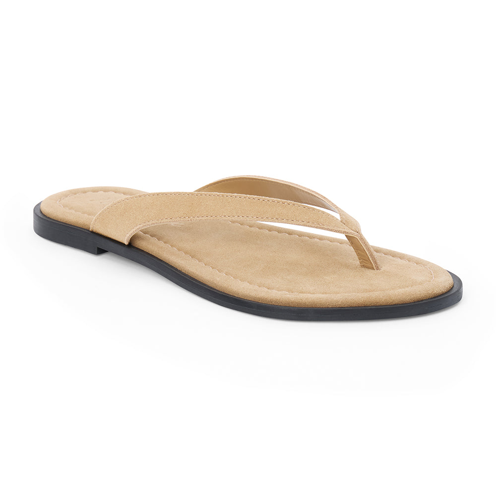Taupe suede flip flop sandal with cushioned footbed and flat sole, shown on a white background.