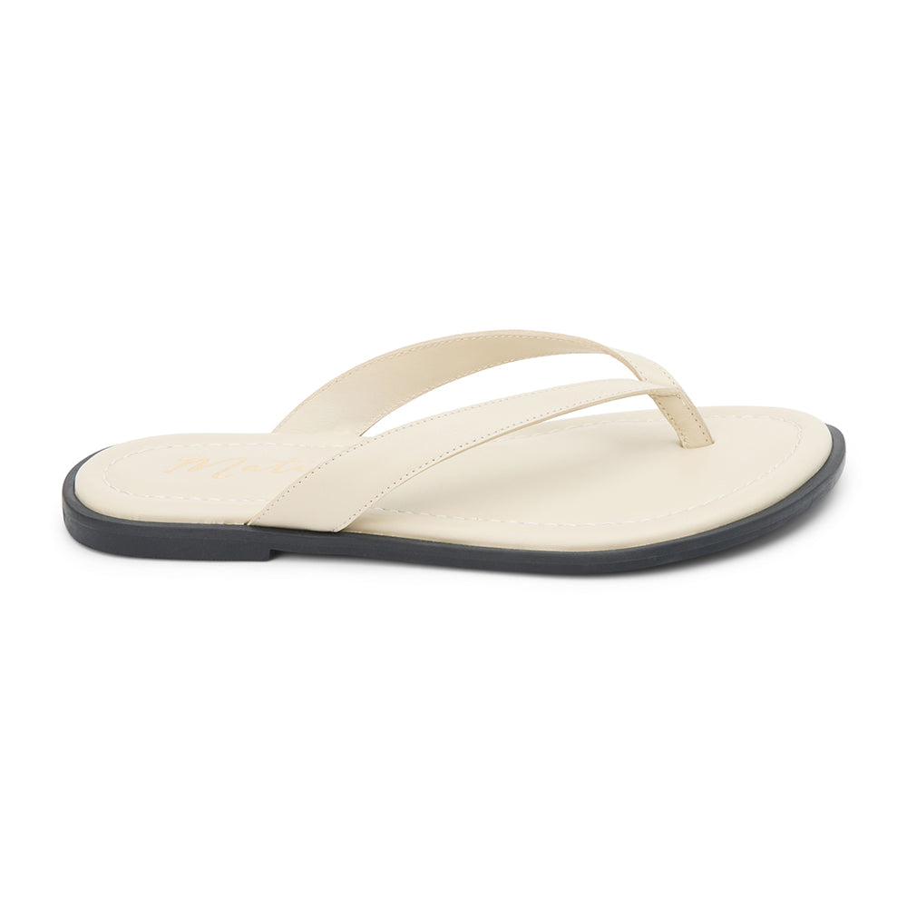 Leo Flip Flop Sandal – Matisse Footwear – Ivory leather flip flop sandals with cushioned footbed, wide thong strap, and sleek black sole. A laid-back yet refined essential for casual summer comfort.