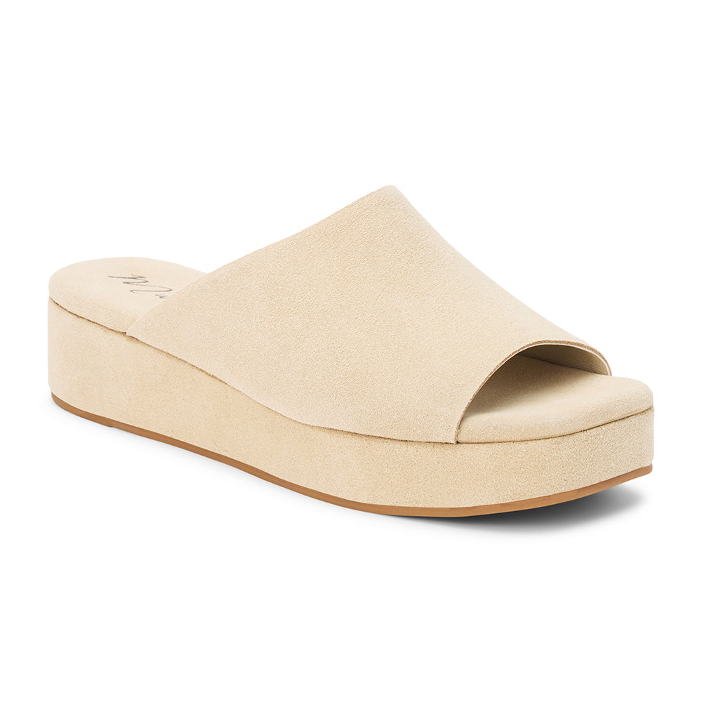 Light beige suede slide sandal with a wide single strap, open toe, platform sole, and slip-on design, shown in side profile on a white background.