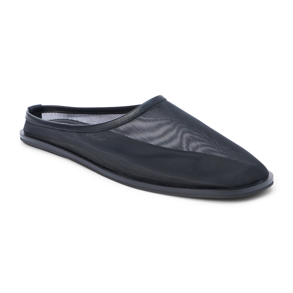 Black mesh slip-on mule with closed toe, open back, low-profile sole, shown in side profile on a white background.