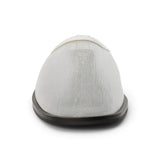 White mesh slip-on mule with closed toe, open back, low-profile sole, shown in front profile on a white background.