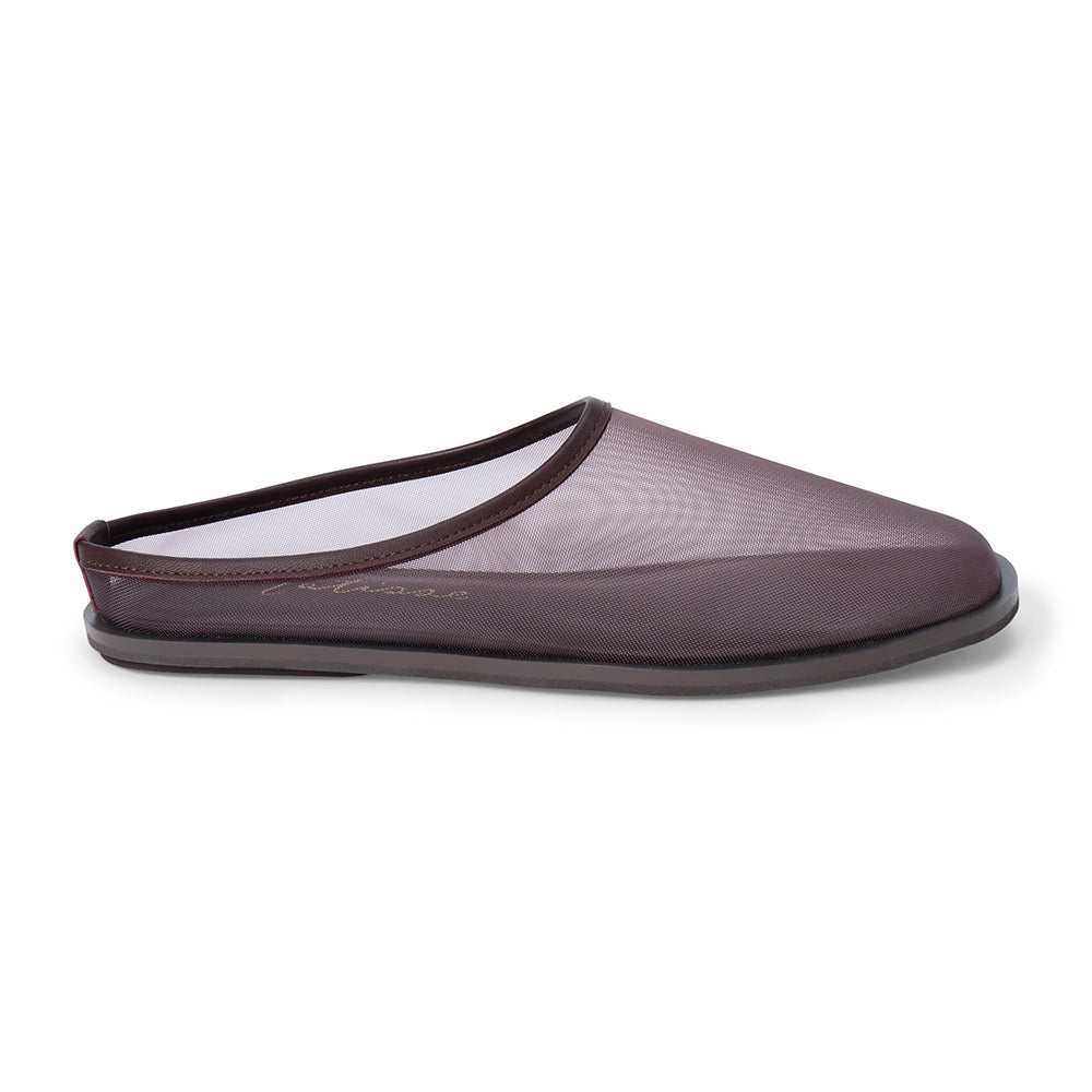 Dark brown mesh slip-on mule with closed toe, open back, low-profile sole, shown in side profile on a white background.