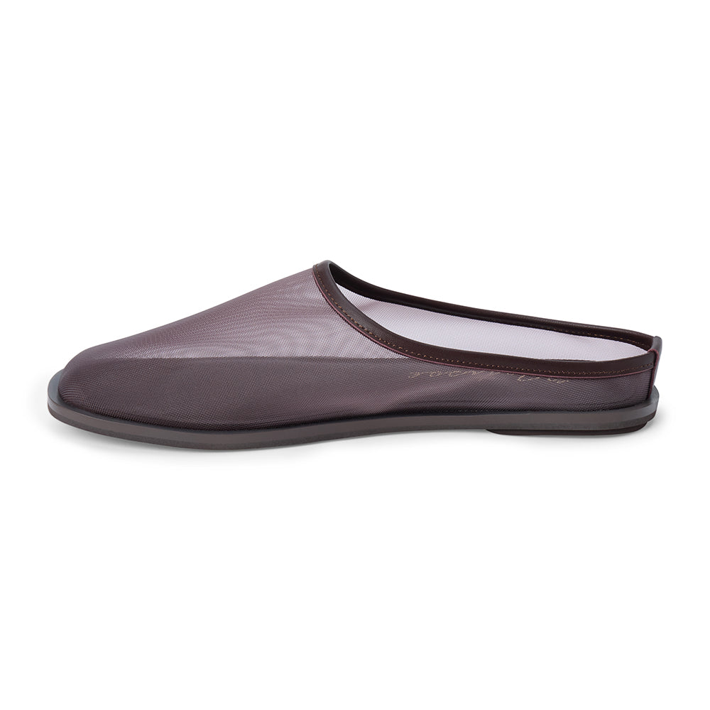 Dark brown mesh slip-on mule with closed toe, open back, low-profile sole, shown in side profile on a white background.