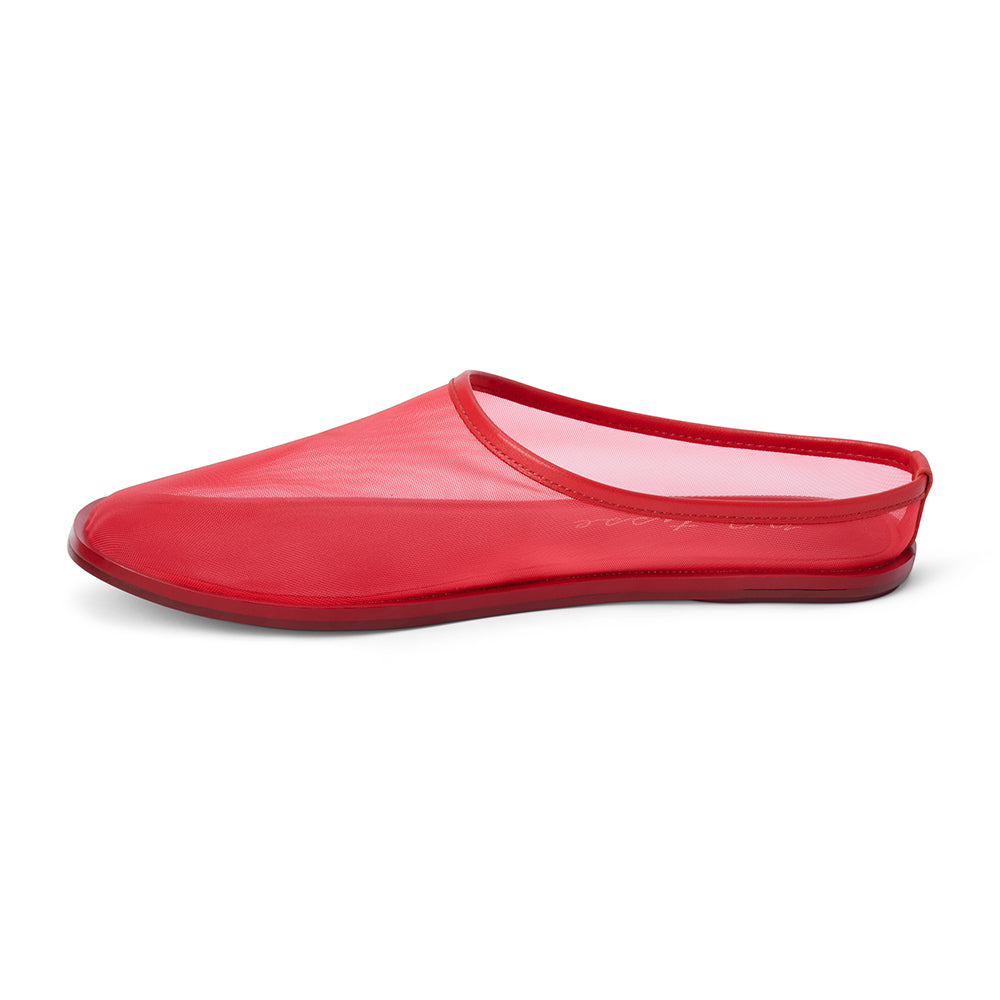 Red mesh slip-on mule with closed toe, open back, low-profile sole, shown in side profile on a white background.