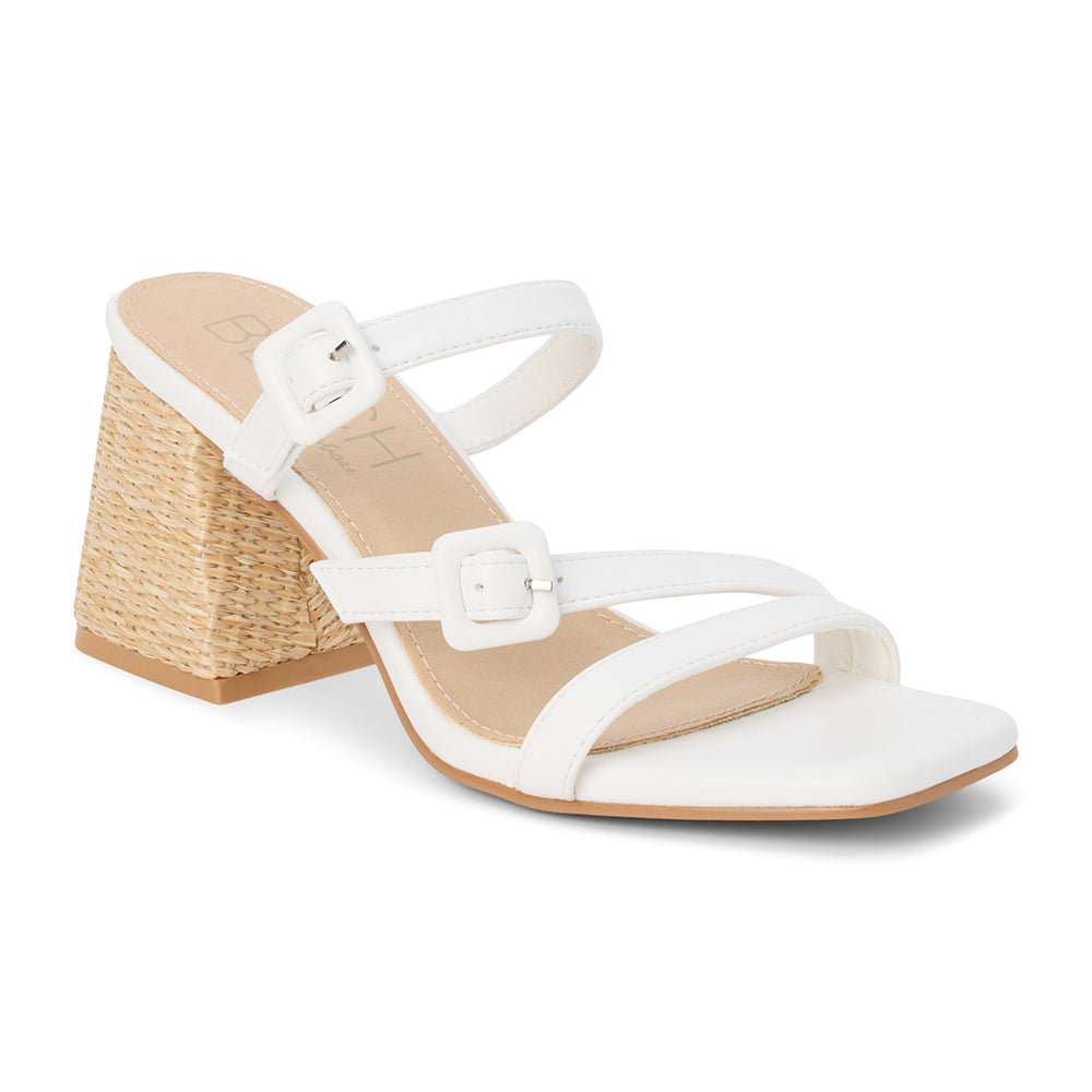 White faux leather sandal with adjustable buckle straps, open square toe, raffia-wrapped block heel, and slip-on design, shown on a white background.