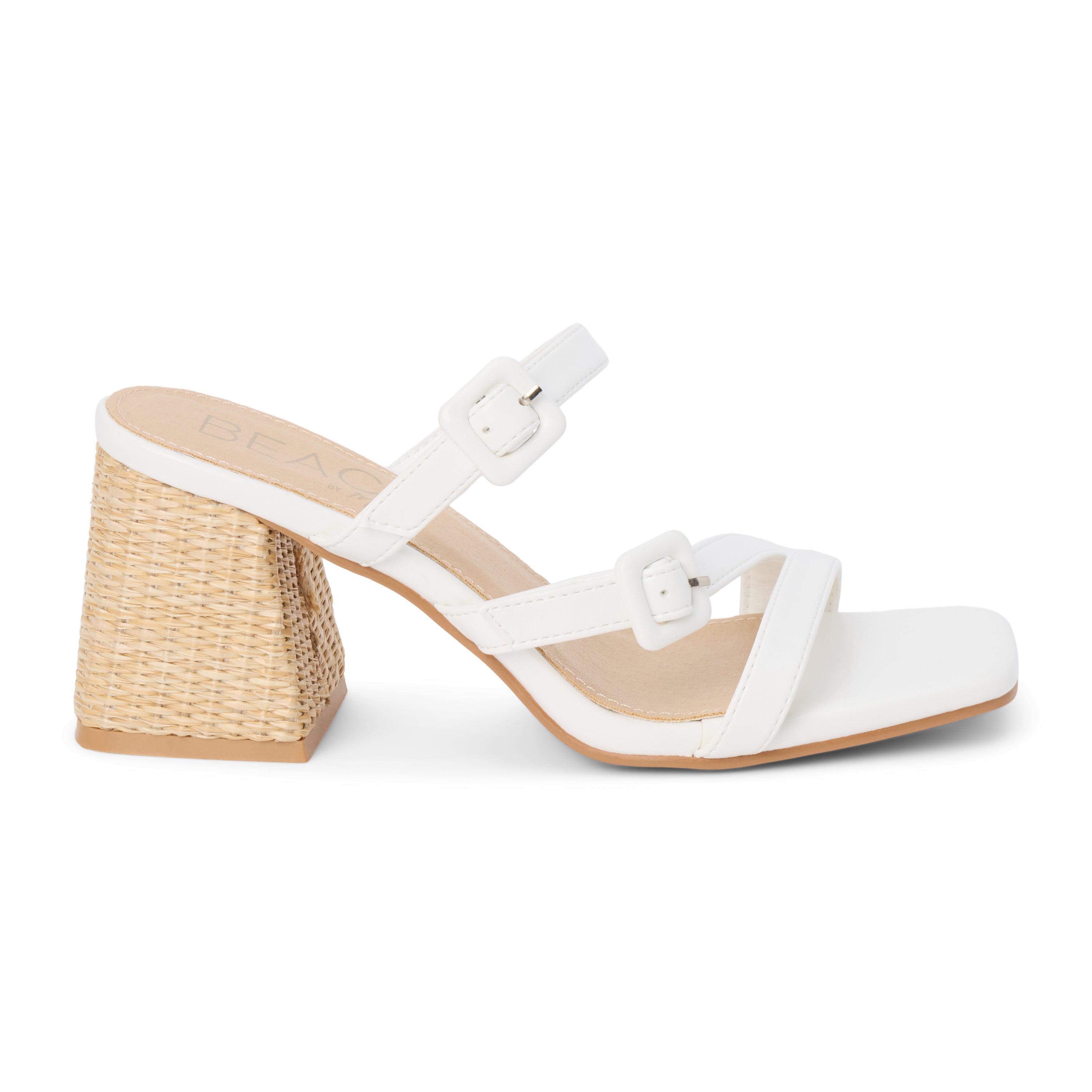 White faux leather sandal with adjustable buckle straps, open square toe, raffia-wrapped block heel, and slip-on design, shown on a white background.