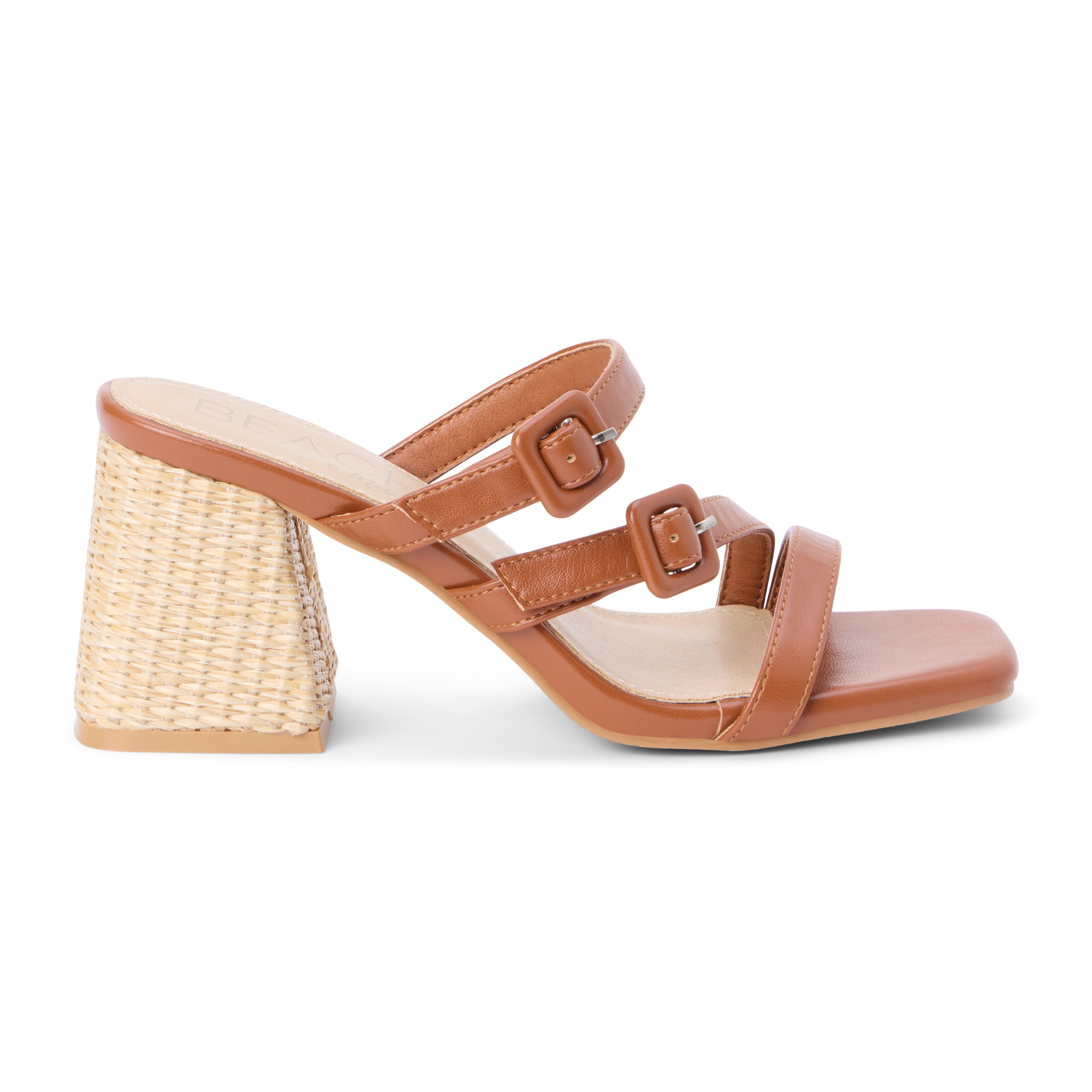 Cognac faux leather sandal with adjustable buckle straps, open square toe, raffia-wrapped block heel, and slip-on design, shown on a white background.