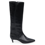 Vegan black faux leather knee-high boot with a tall shaft, pointed toe, and slim black kitten heel shown on a white background.
