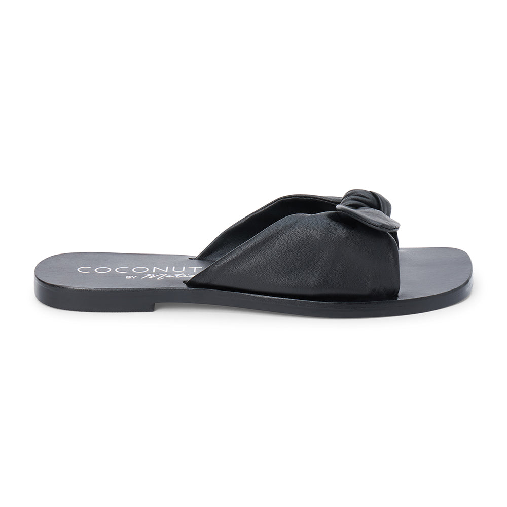 Black leather slide sandal with knotted strap and open toe shown on a white background.