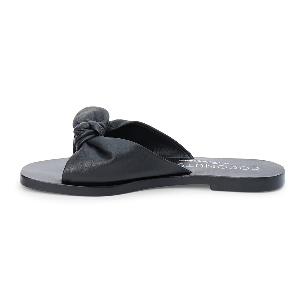 Black leather slide sandal with knotted strap and open toe shown on a white background.