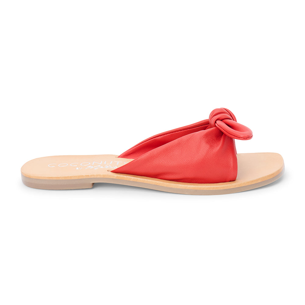 Red leather slide sandal with knotted strap and open toe shown on a white background.