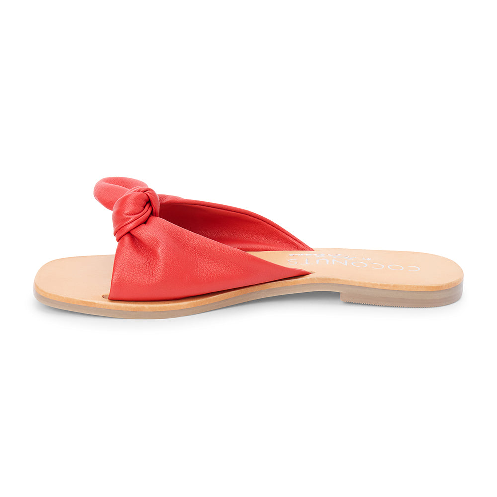 Red leather slide sandal with knotted strap and open toe shown on a white background.