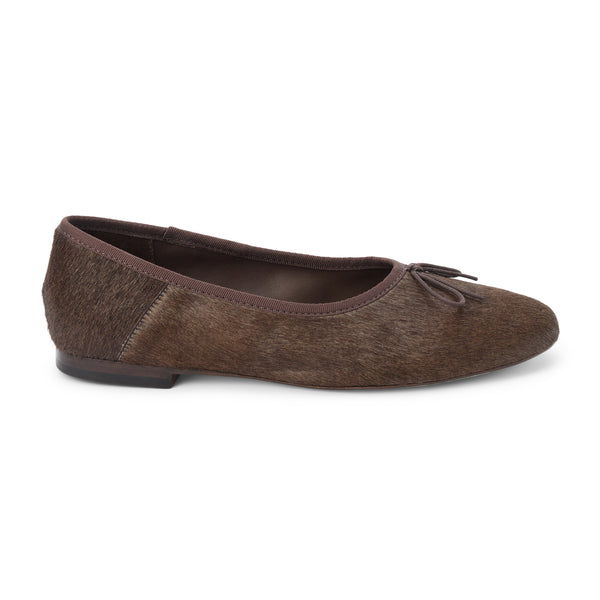 Marie Ballet Flat - Lenore by Matisse - Brown cow hair ballet flats with a classic round-toe silhouette, delicate bow detail, and padded leather insole. A timeless essential for effortless everyday elegance.