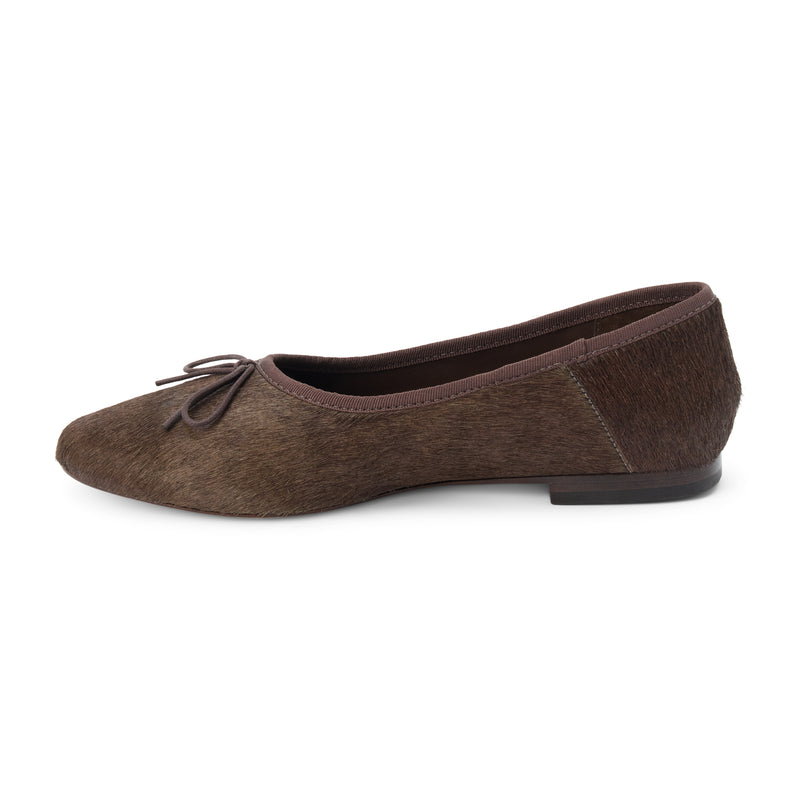 Marie Ballet Flat - Lenore by Matisse - Brown cow hair ballet flats with a classic round-toe silhouette, delicate bow detail, and padded leather insole. A timeless essential for effortless everyday elegance.