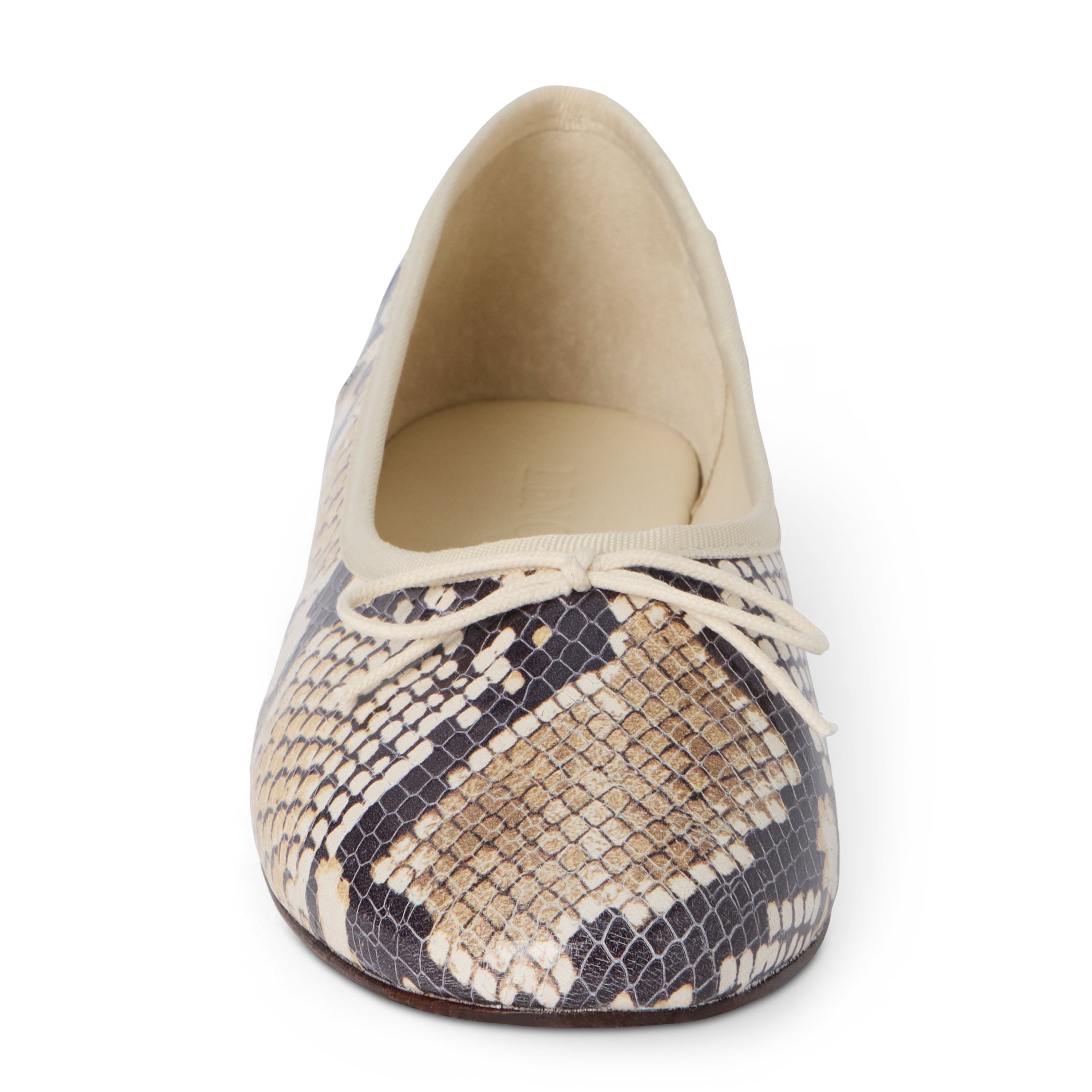 Tan, brown, and black snake-print leather ballet flat with an ivory bow, rounded toe, tonal trim, and low heel shown on a white background.