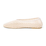 Ivory woven mesh ballet flat with a closed toe, low-profile sole, and slip-on design, shown on a white background.