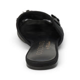 Black mesh mule with floral embellishments, slip-on design, low flat sole, and pointed toe, shown on a white background.